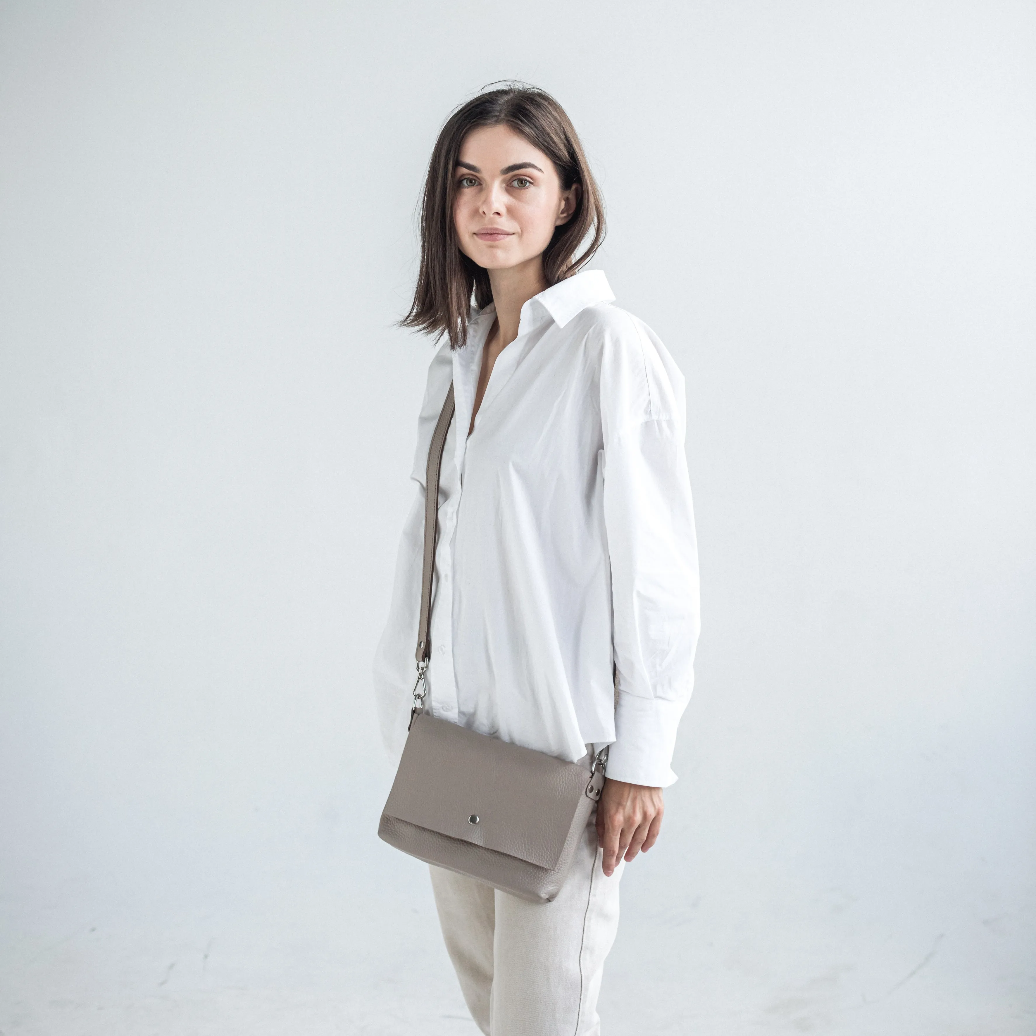 Beige pebbled leather crossbody bag