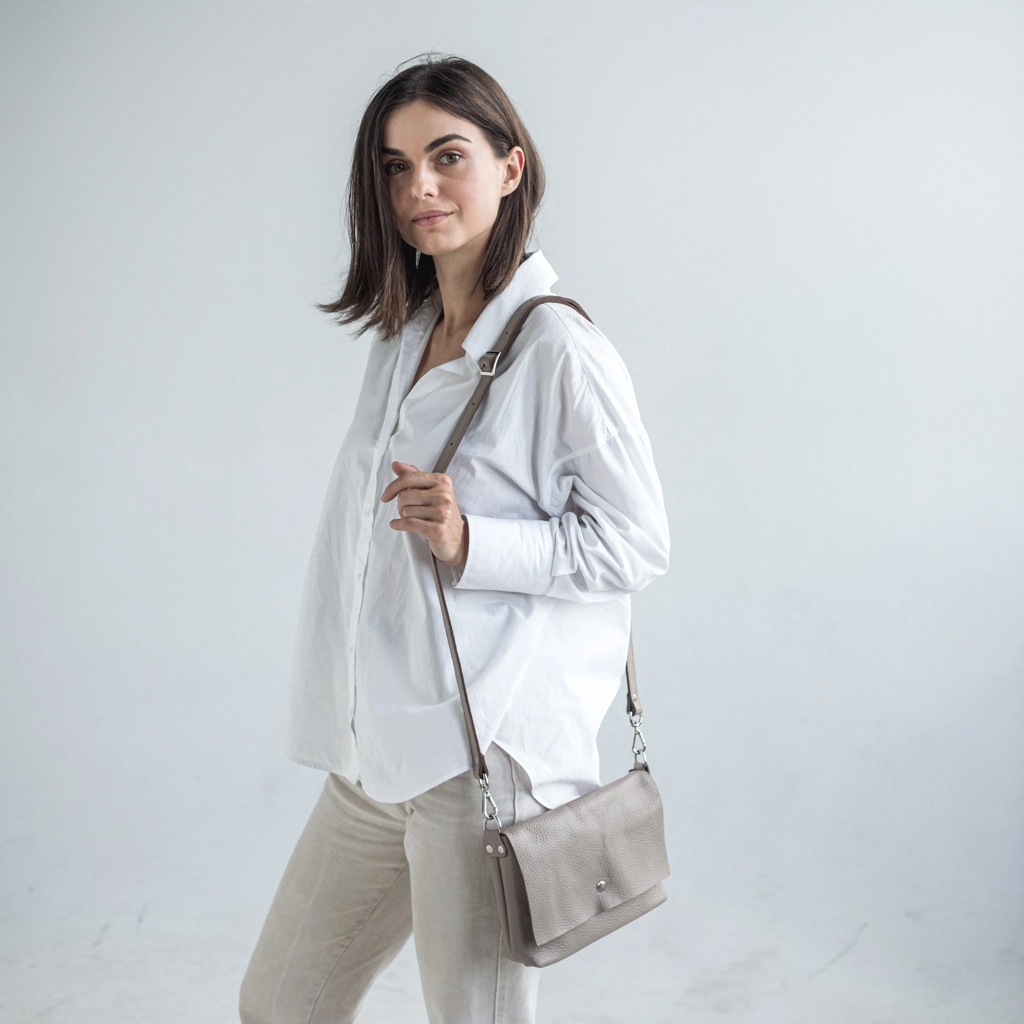 Beige pebbled leather crossbody bag