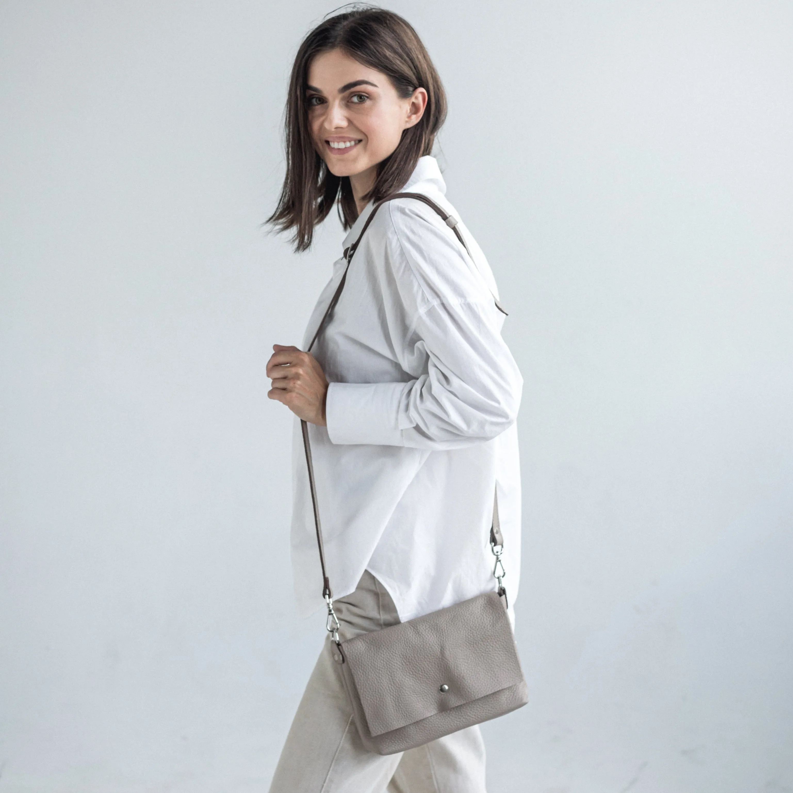 Beige pebbled leather crossbody bag