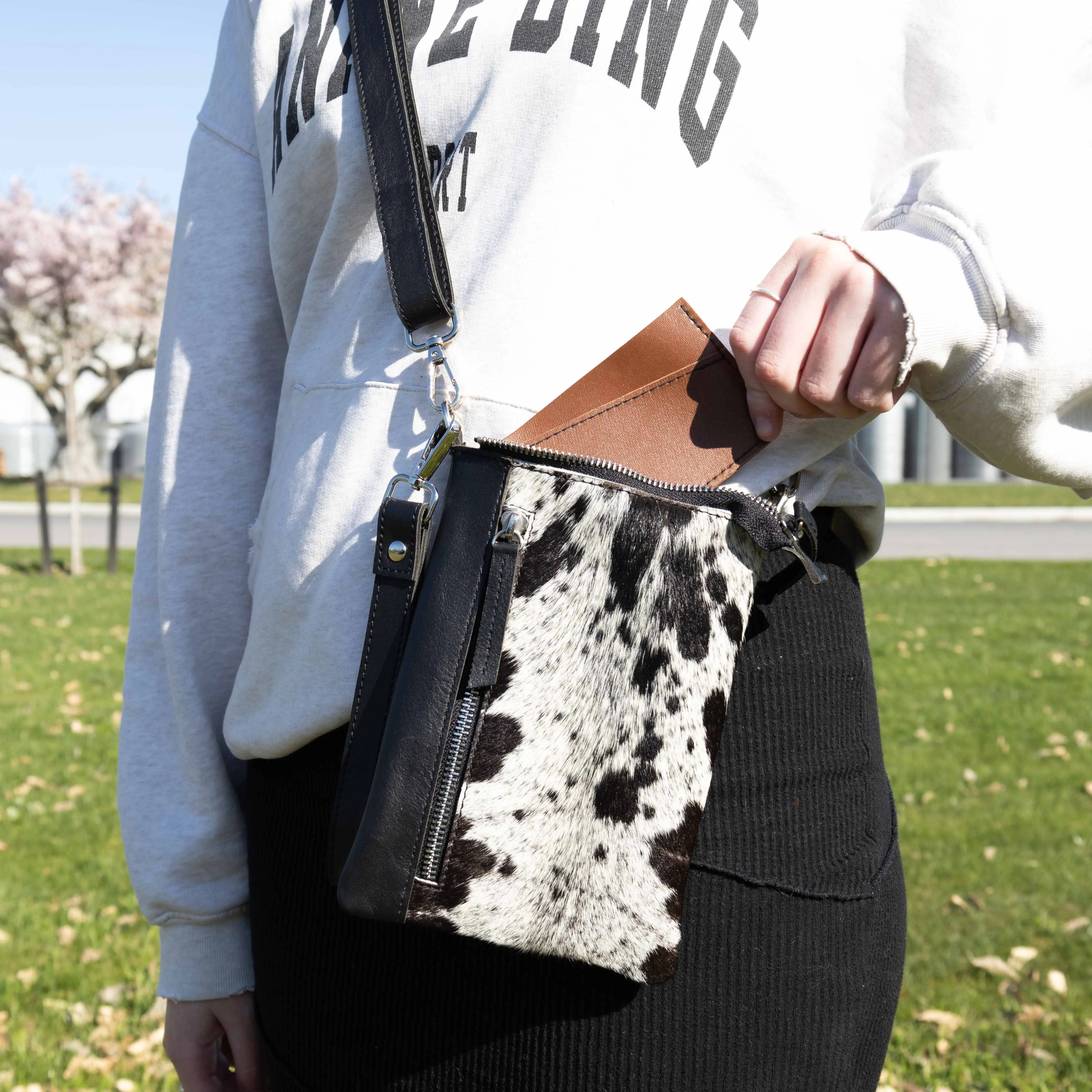The Boomerang Cowhide Crossbody Phone Bag